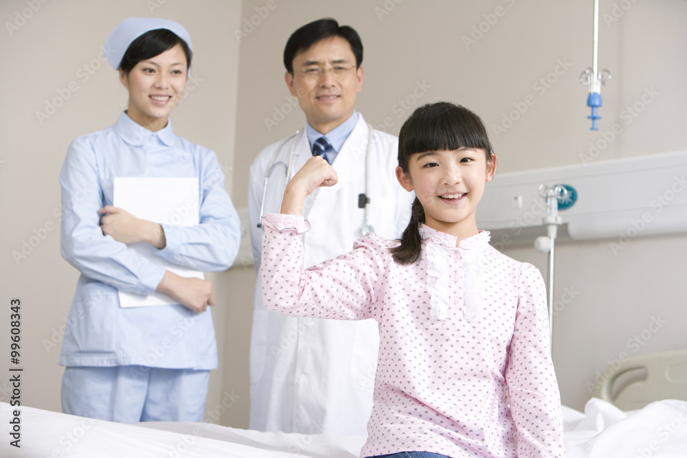 Portrait of a young and healthy girl and her doctor and nurse