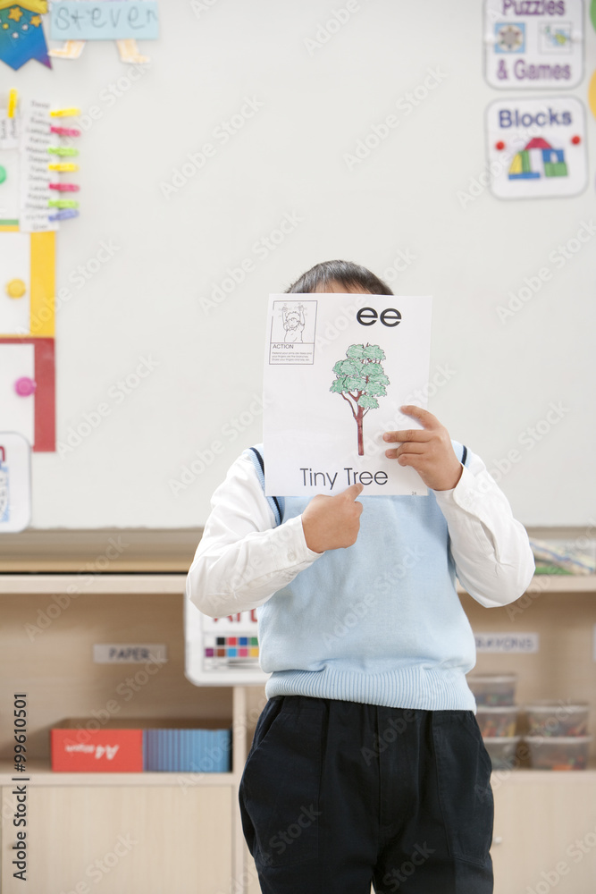 Student presenting his work in front of class