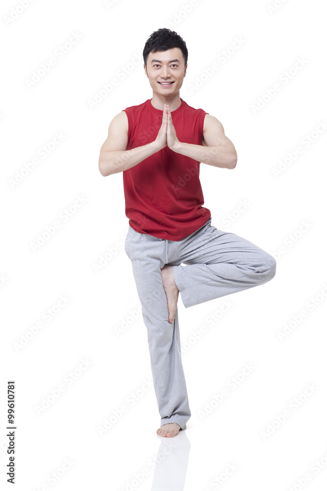 Young man doing yoga