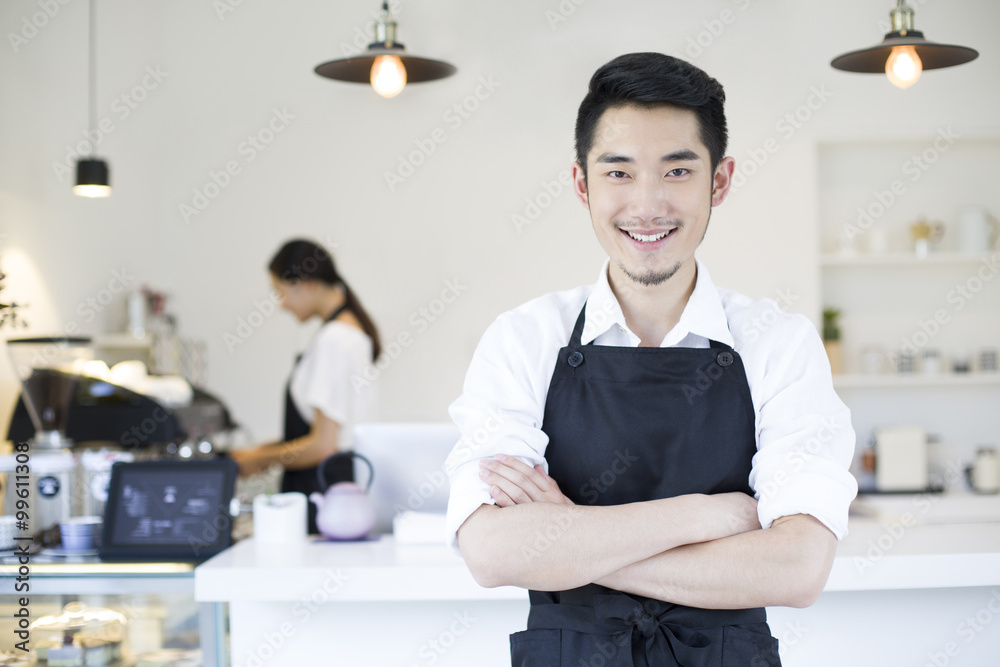 Portrait of coffee shop owner