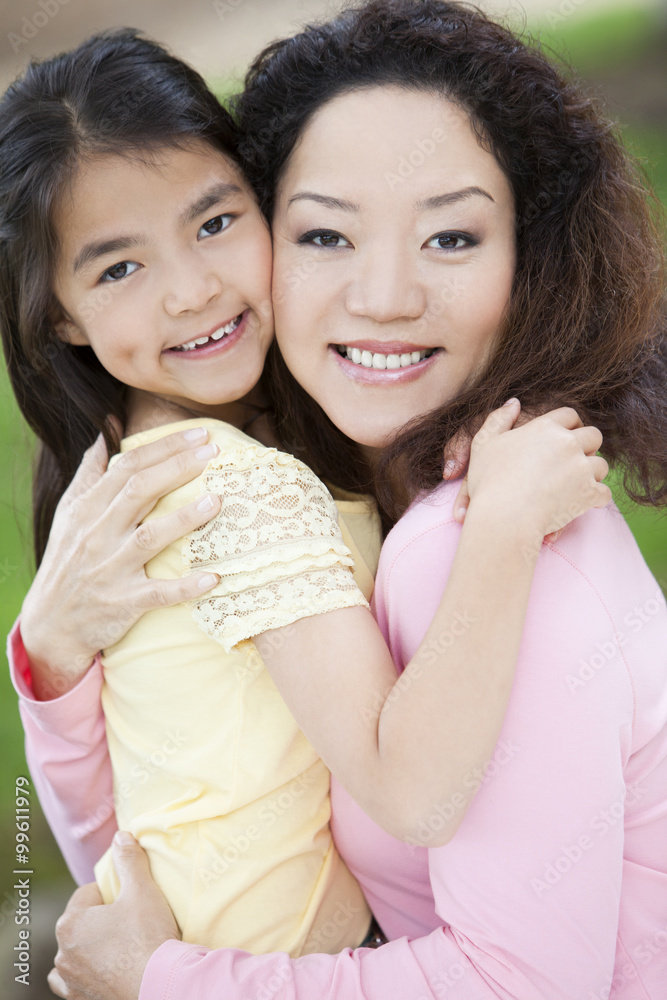 Happy mother and daughter embracing