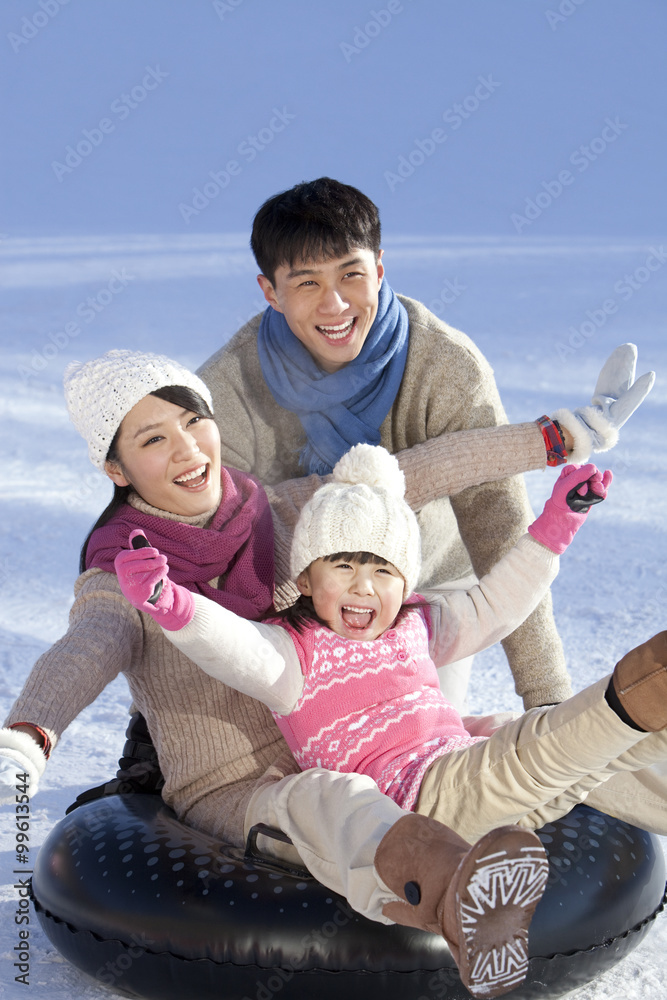 Family having fun in snow