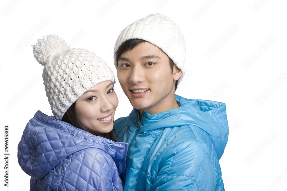 Young couple in winter clothes