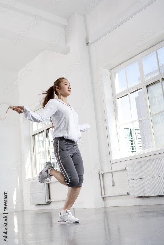 Young Woman Jump Roping