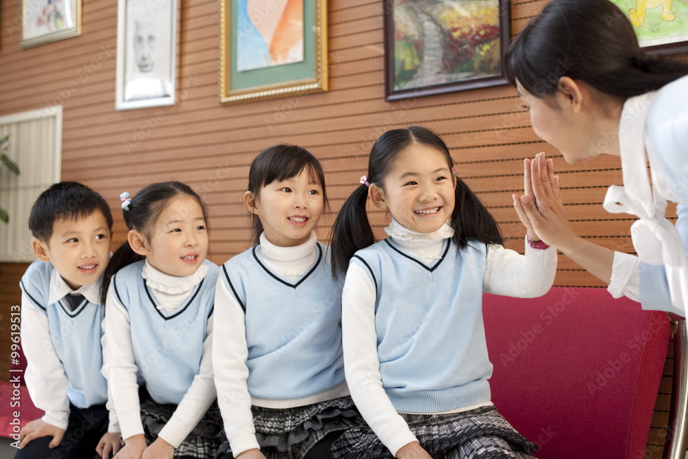 Teacher bonding with her students