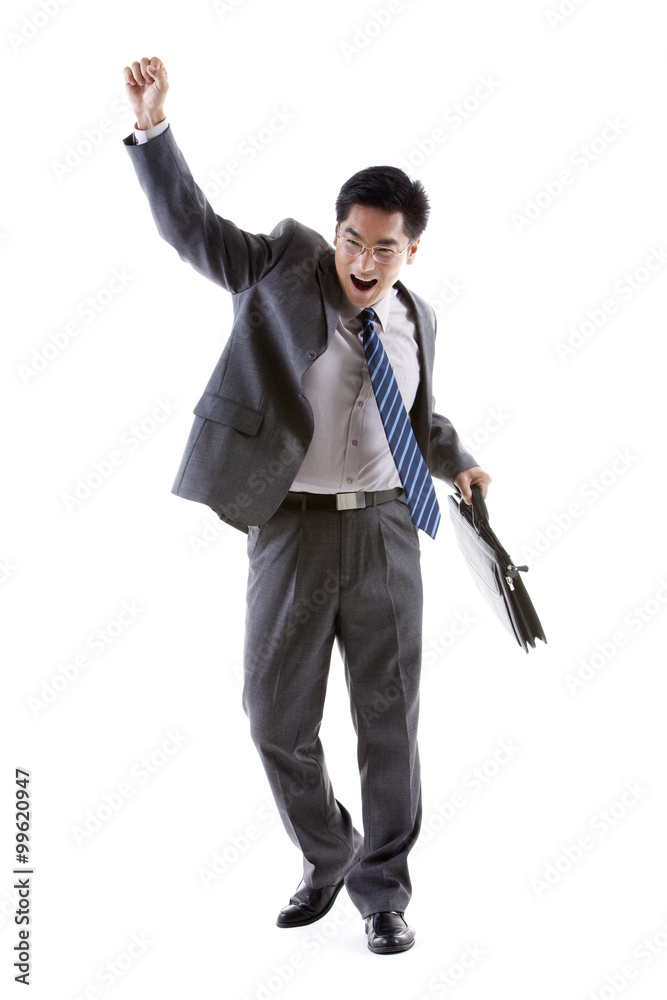 Businessman punching the air