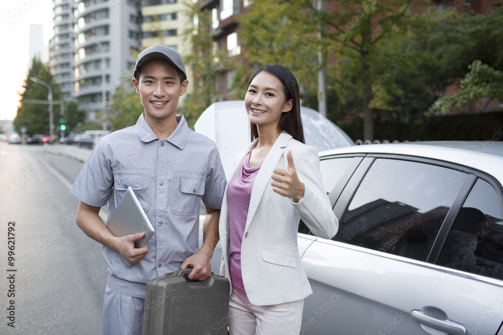 Auto mechanic and car owner