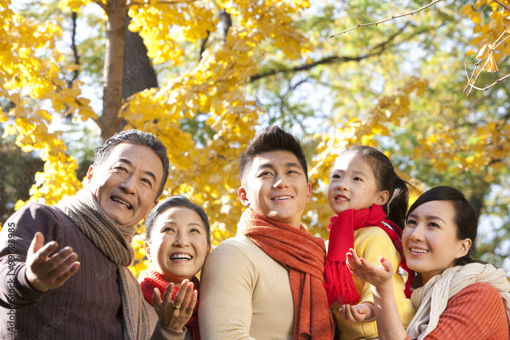 Family in a park in Autumn