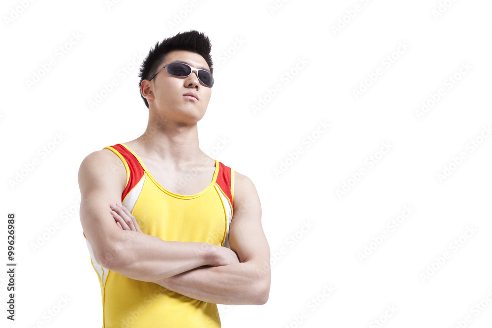 Muscular athlete with sunglasses