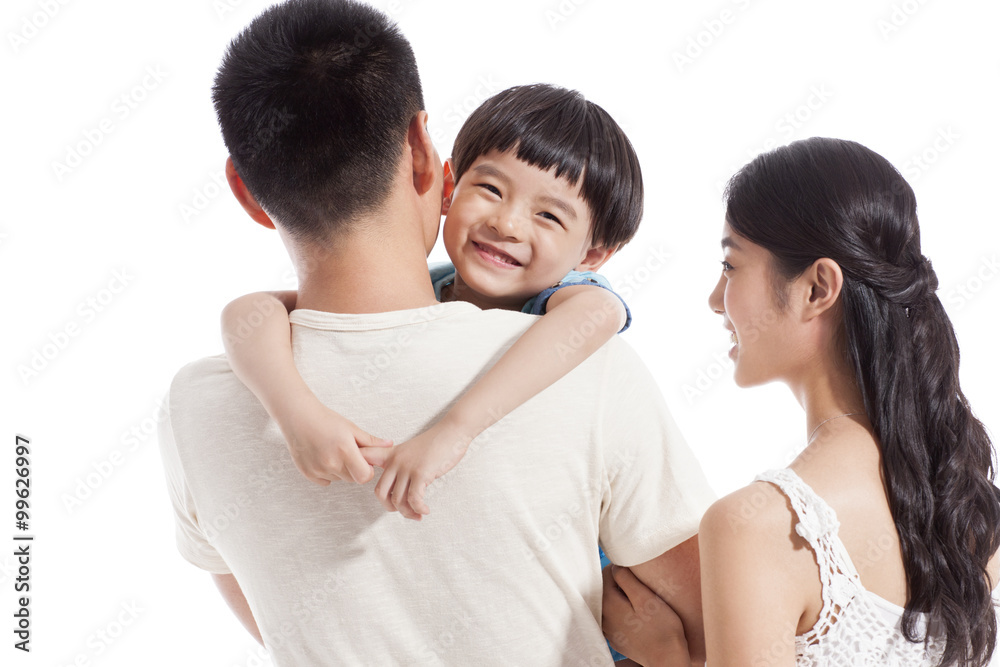 Cheerful little boy and his parents