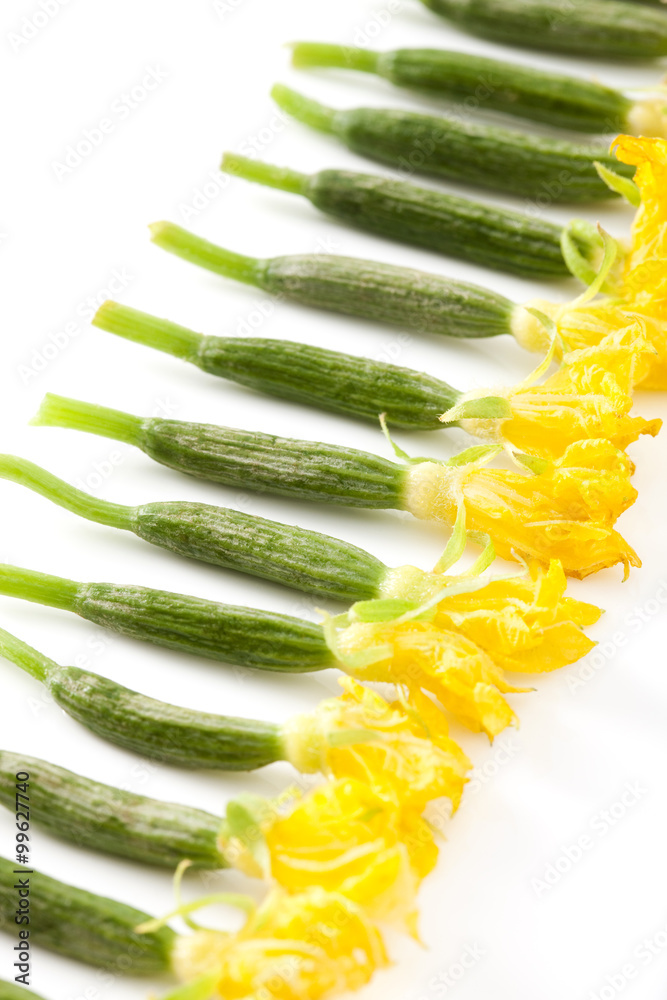 Fresh pickled cucumbers in a row