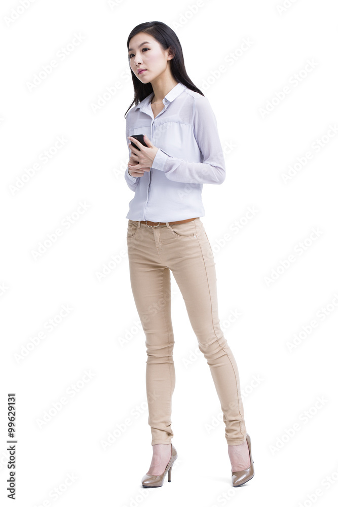 Young woman with mobile phone in hand