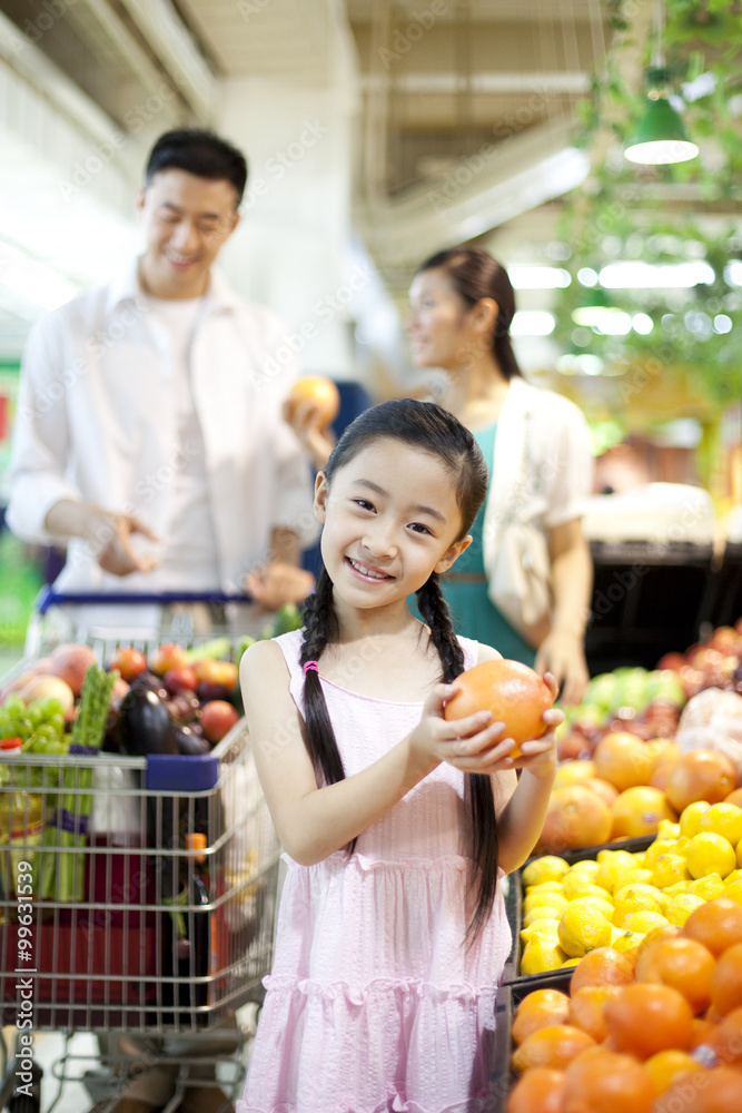 Family shopping in supermarket