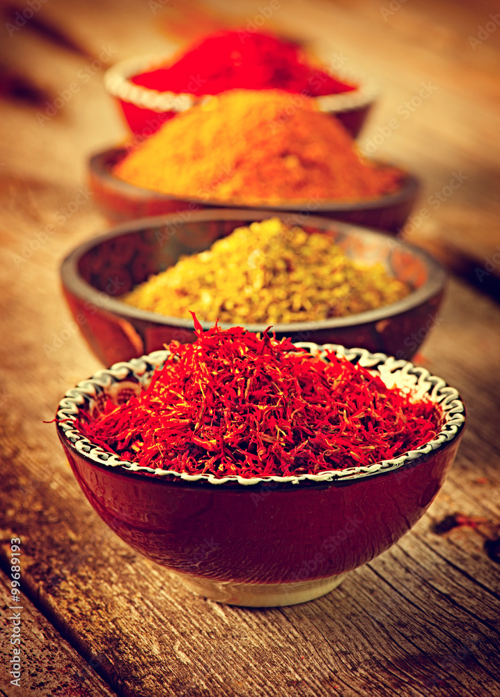 Spice. Various spices over wooden background