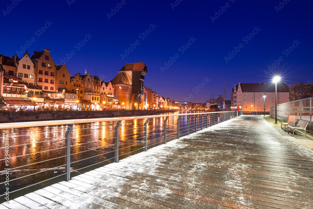 Old town of Gdansk at frozen Motlawa river, Poland