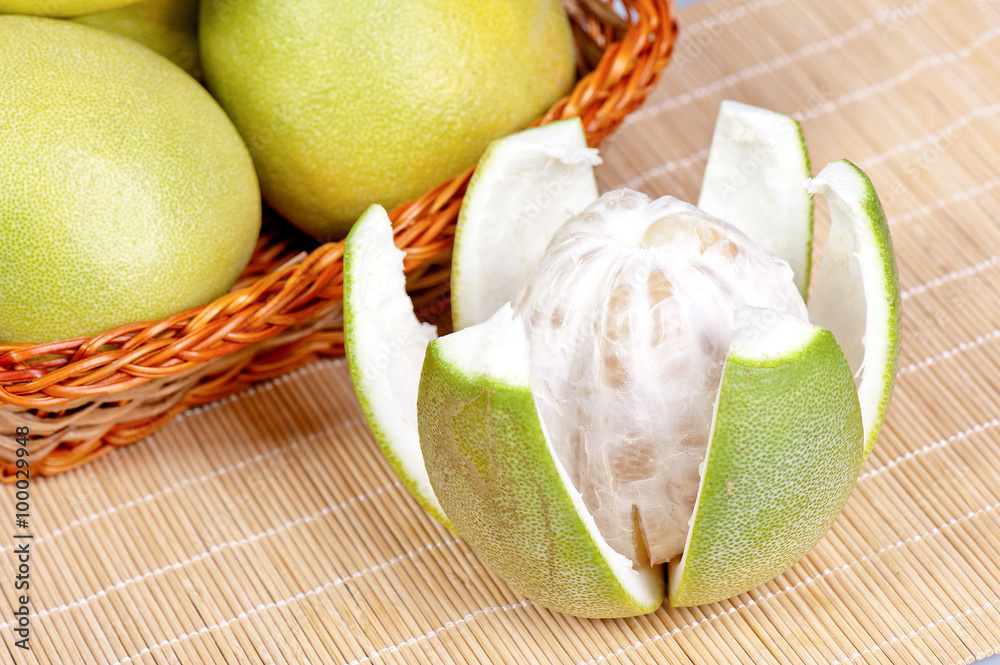 Tasty grapefruit on white background