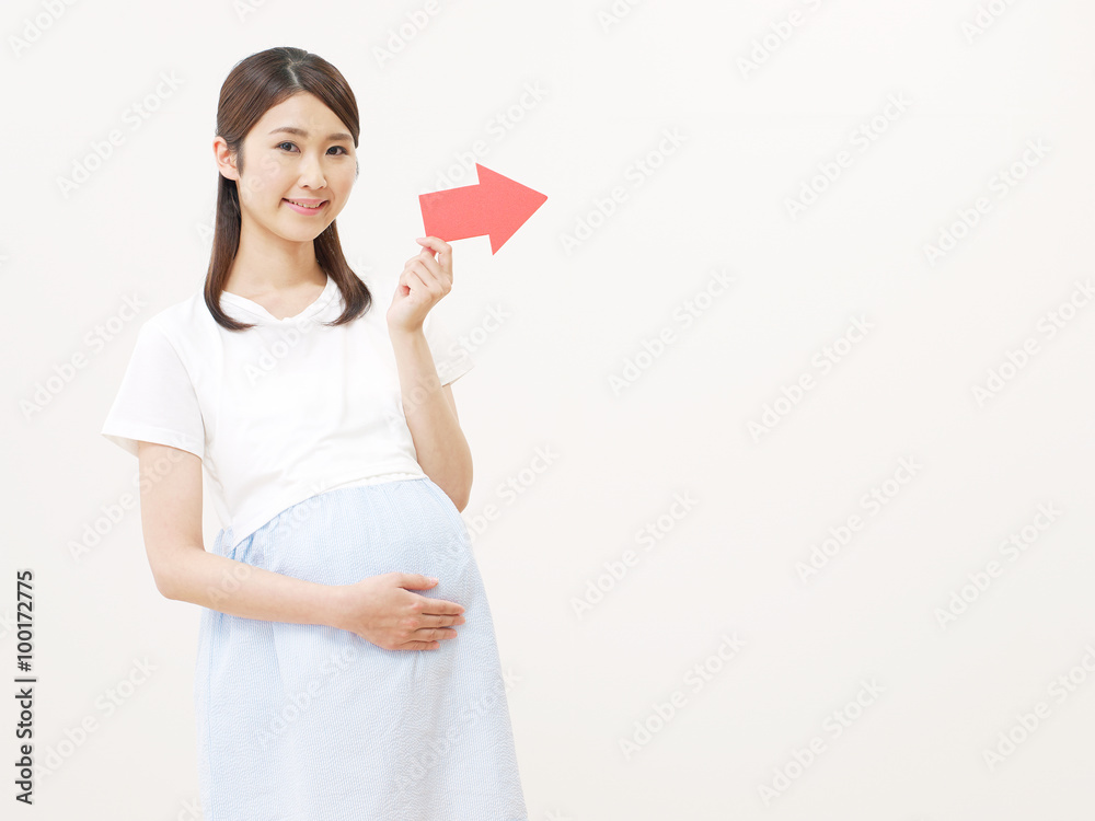 妊婦　矢印指し