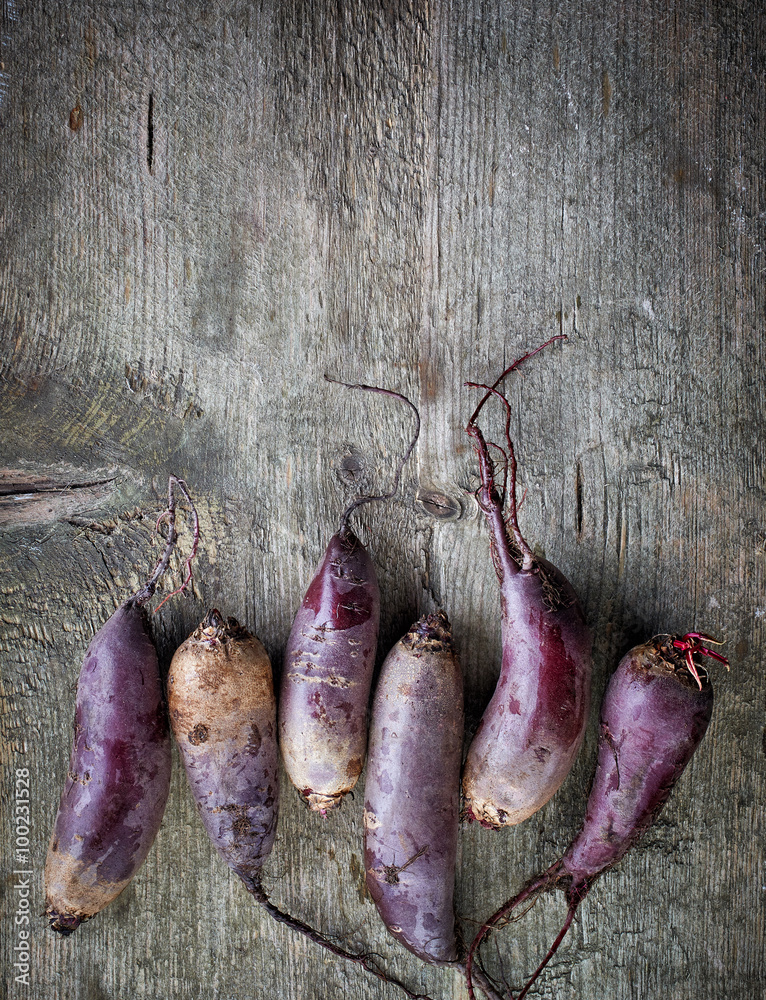 Beet roots on wooden table