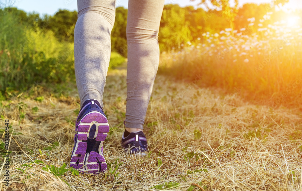 Woman running in a field