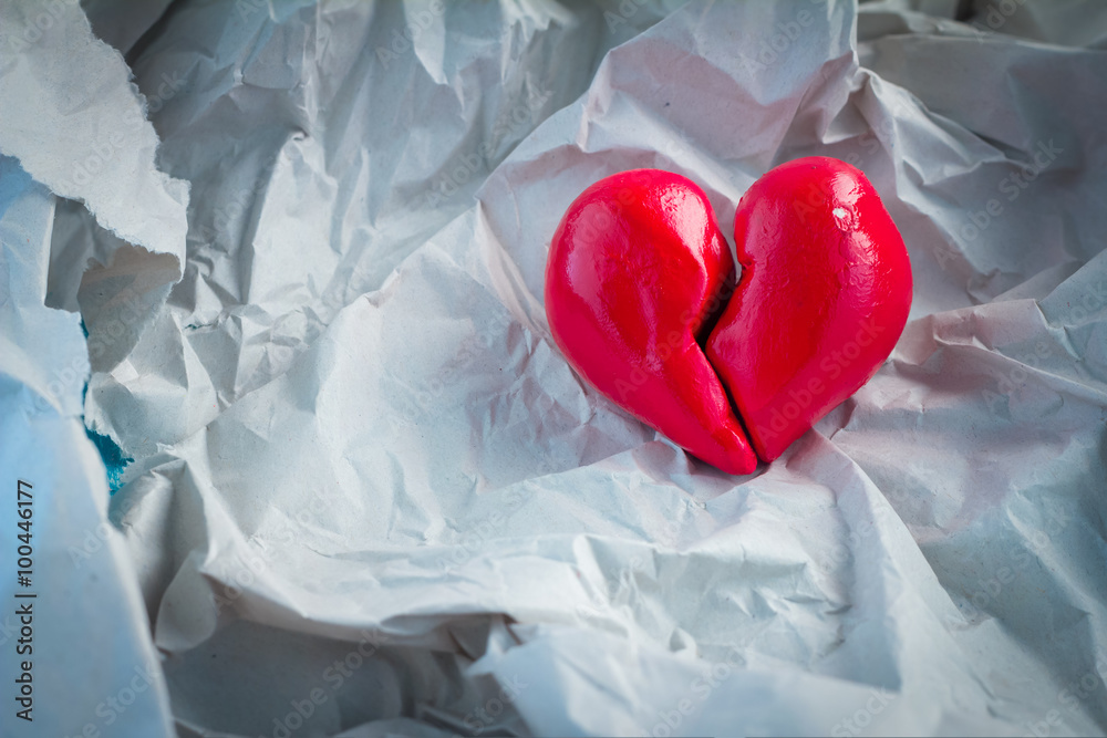 red broken heart closeup on crump paper.jpg