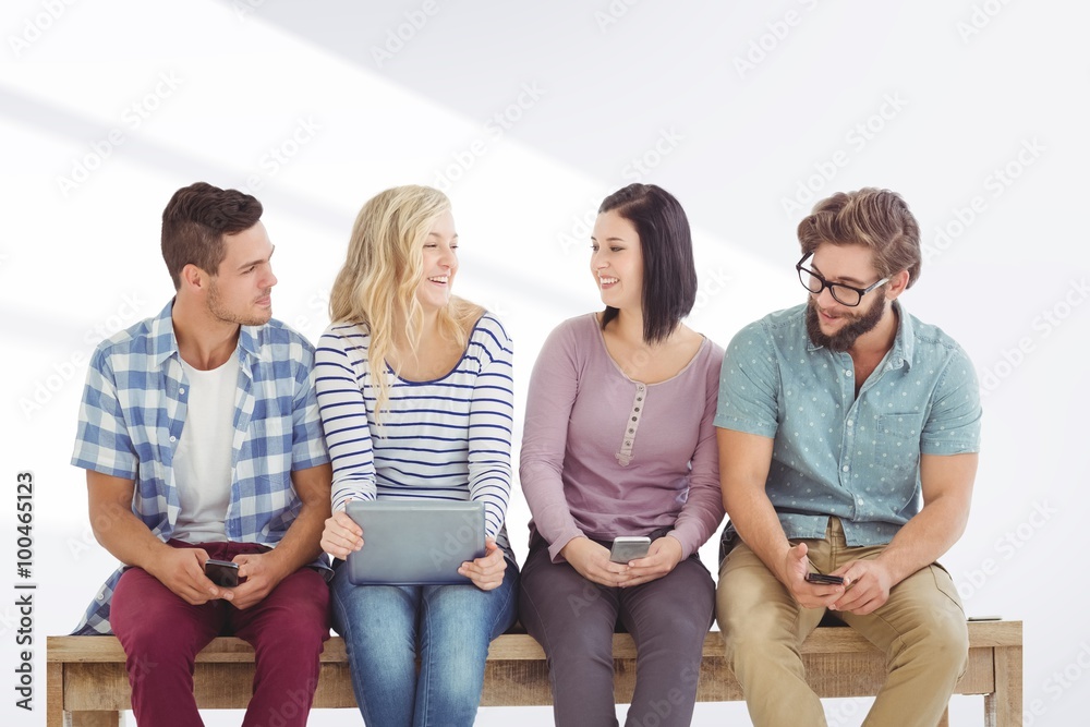 Business people holding electronic devices