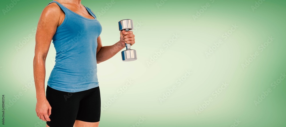 Composite image of muscular woman exercising with dumbbells 