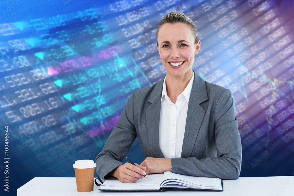 Composite image of smiling businesswoman looking at camera