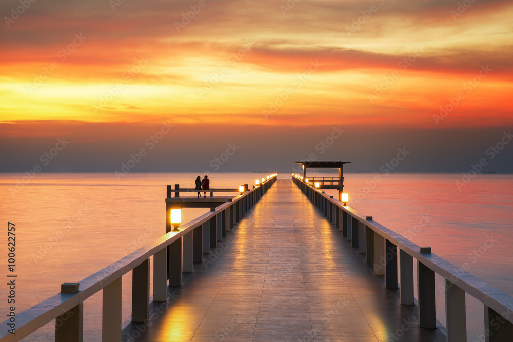 Sweetheart on Wooded bridge with sunset