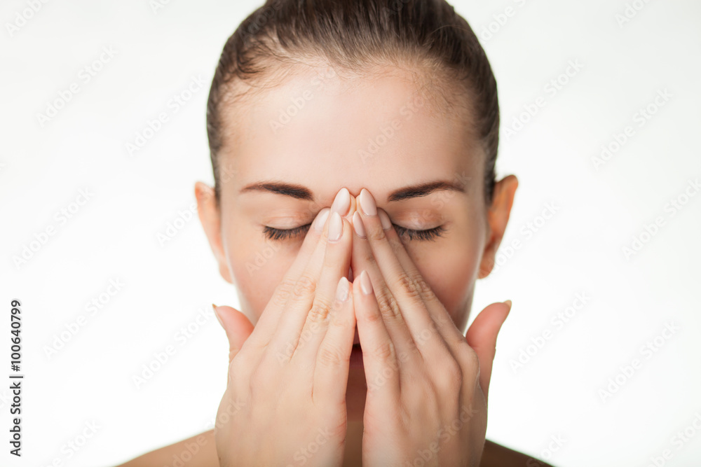 Woman has headache on white background