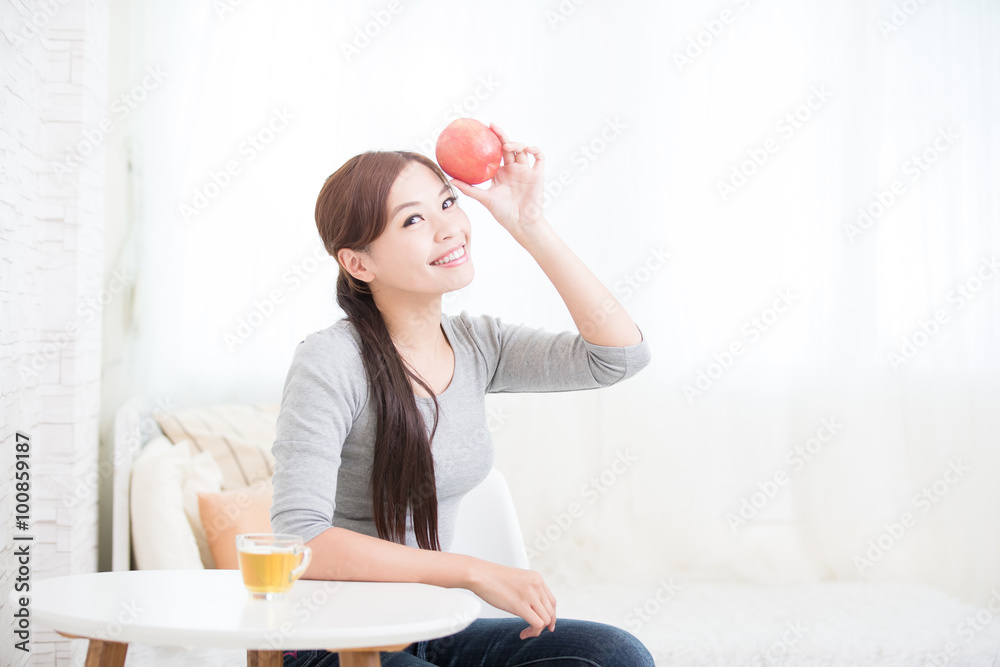 woman hold red apple