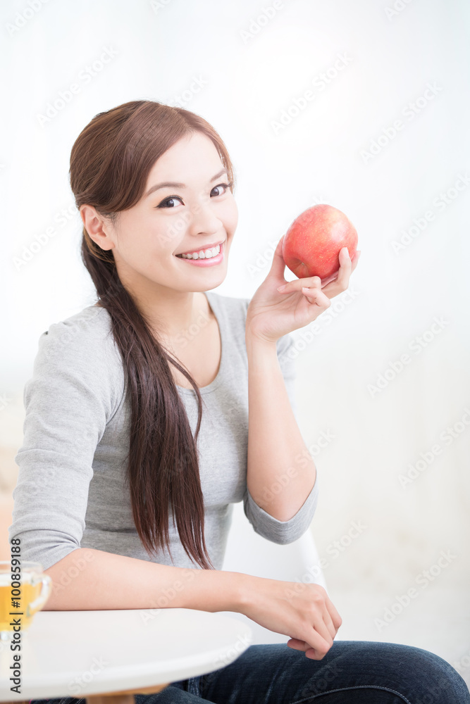 woman hold red apple