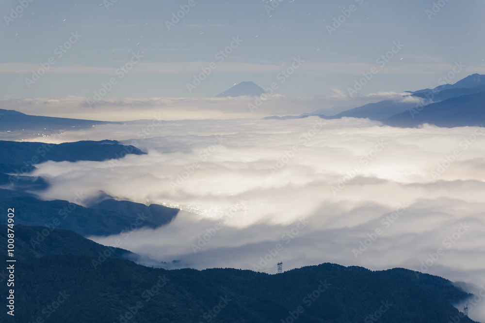 Beautiful Mountain Fuji and lake suwa at sunrise time in autumn season seen from Mt. Takabocci