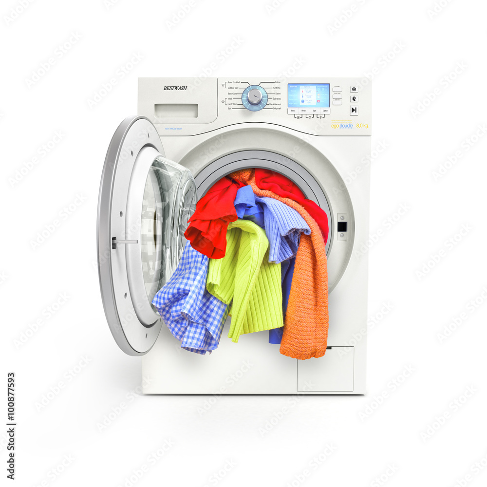 A close up of a washing machine loaded with clothes isolated on