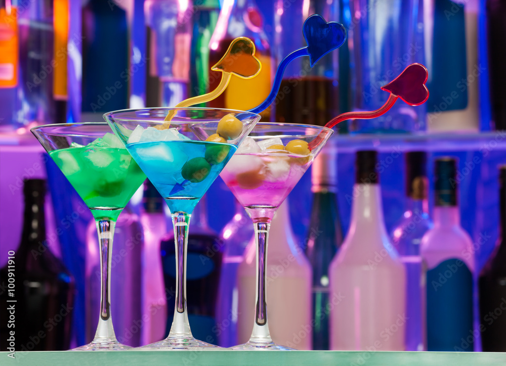 Different cocktail glasses with color drinks