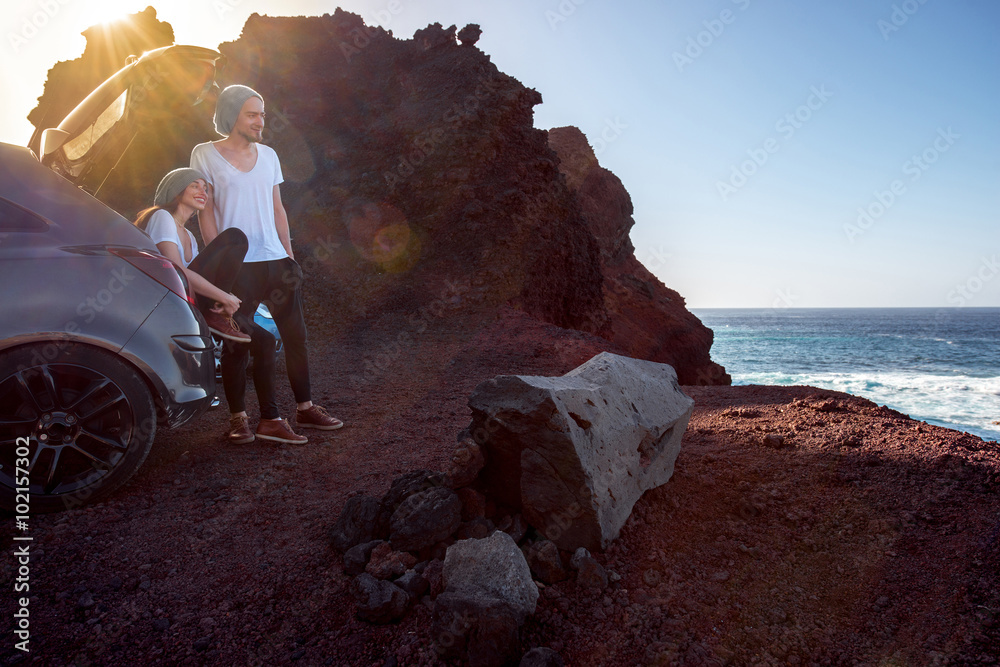 Couple traveling by car