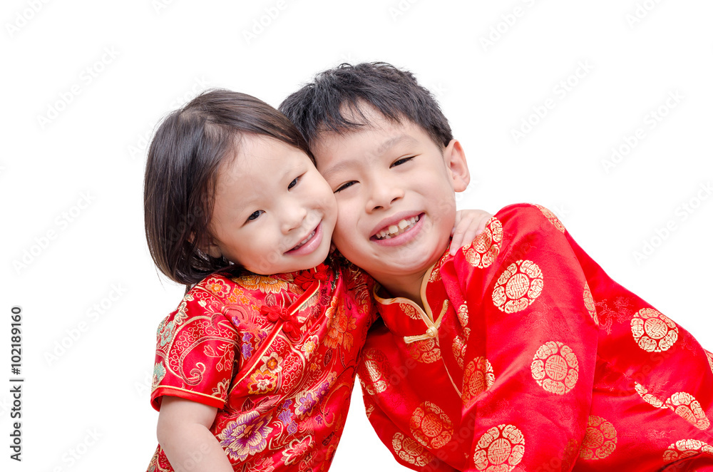 Chinese children in traditional costume over white background