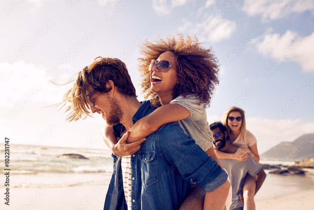 Young friends enjoying a day at beach.