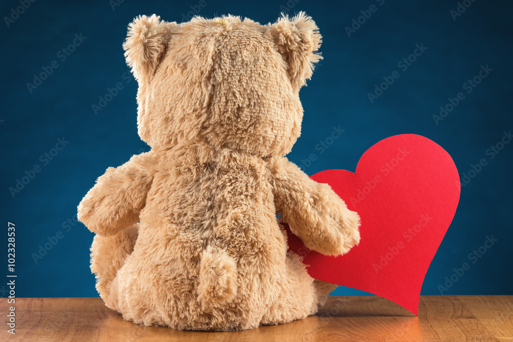 Teddy Bear Holding a Heart