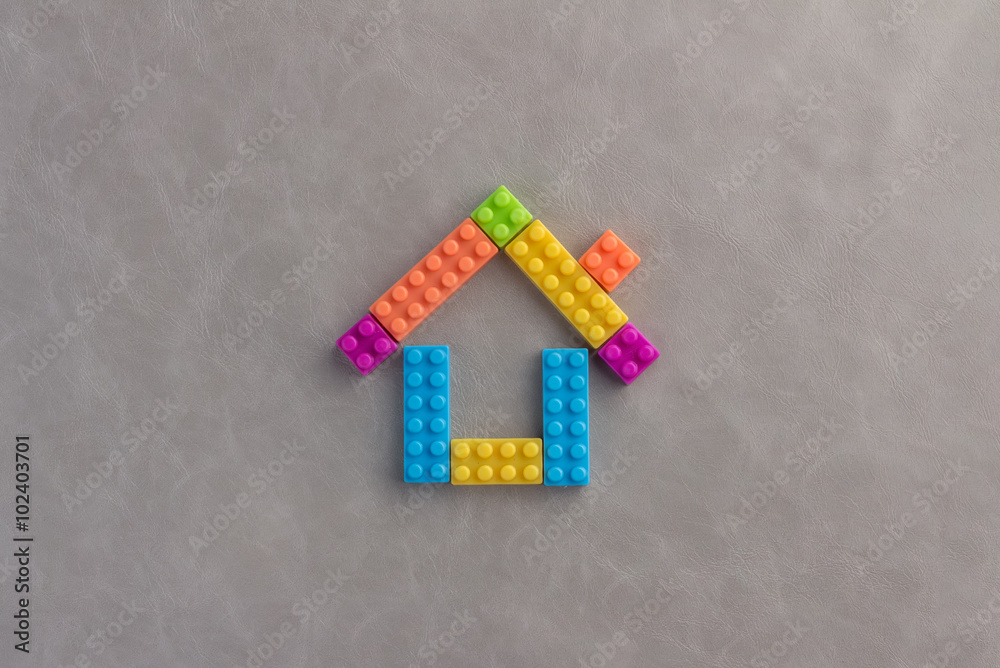 House concept with plastic blocks toy.jpg