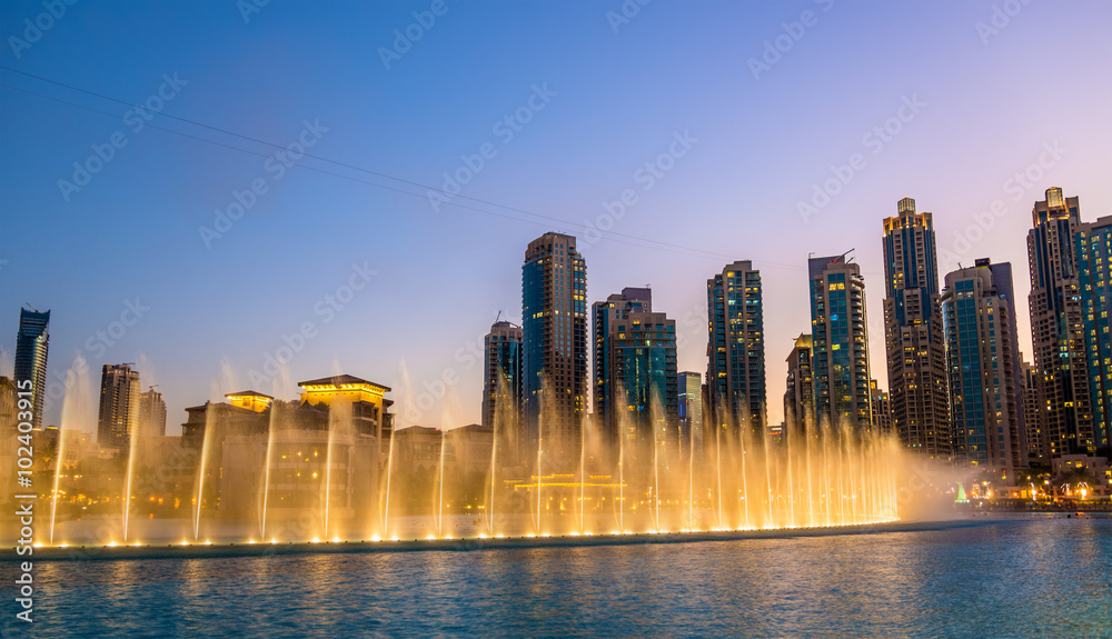 Choreographed Dubai Fountain in the evening - UAE