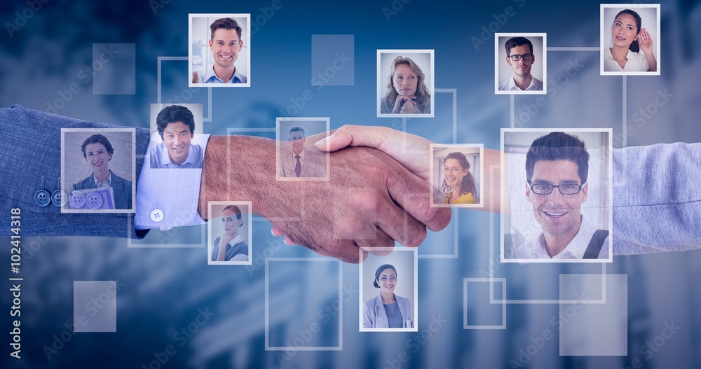 Composite image of business people shaking hands 