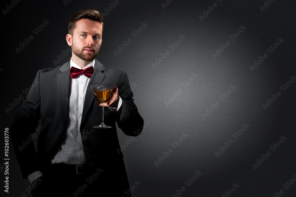 Young man with a cocktail glass