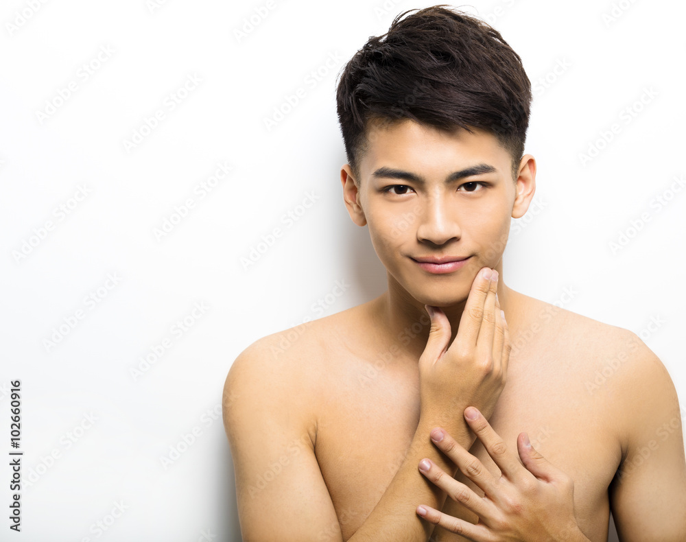 Closeup portrait of attractive young man face