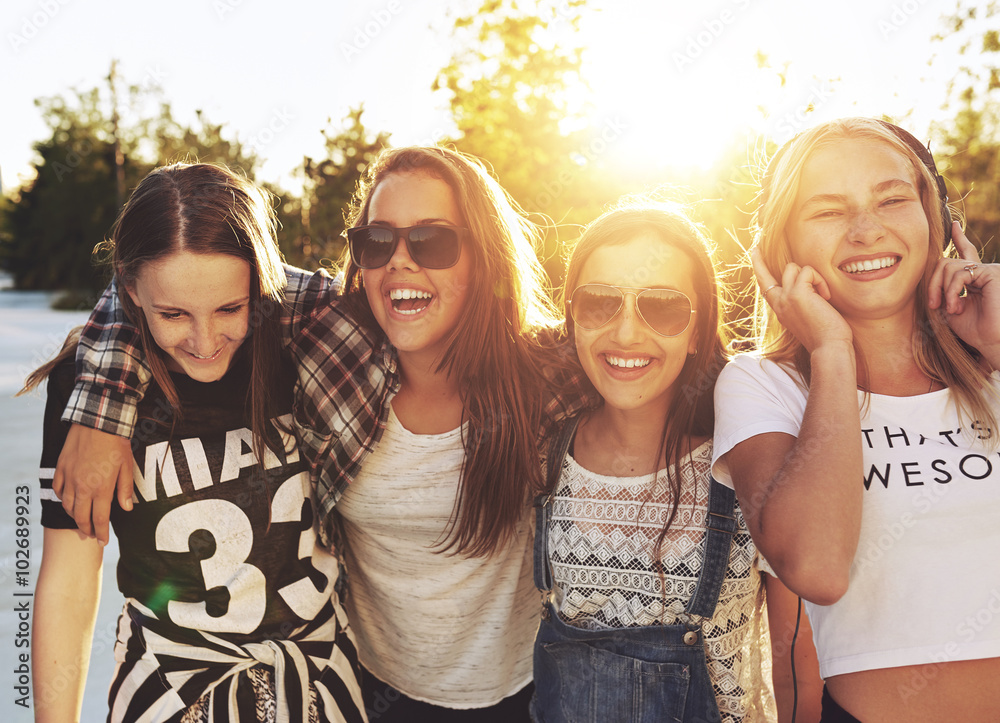 Teenage girls laughing