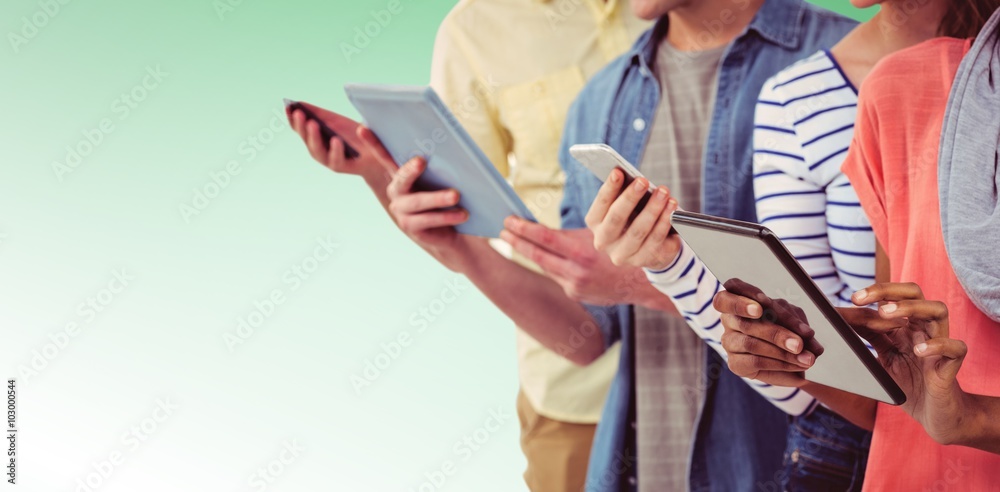 Composite image of smiling creative team standing in a line