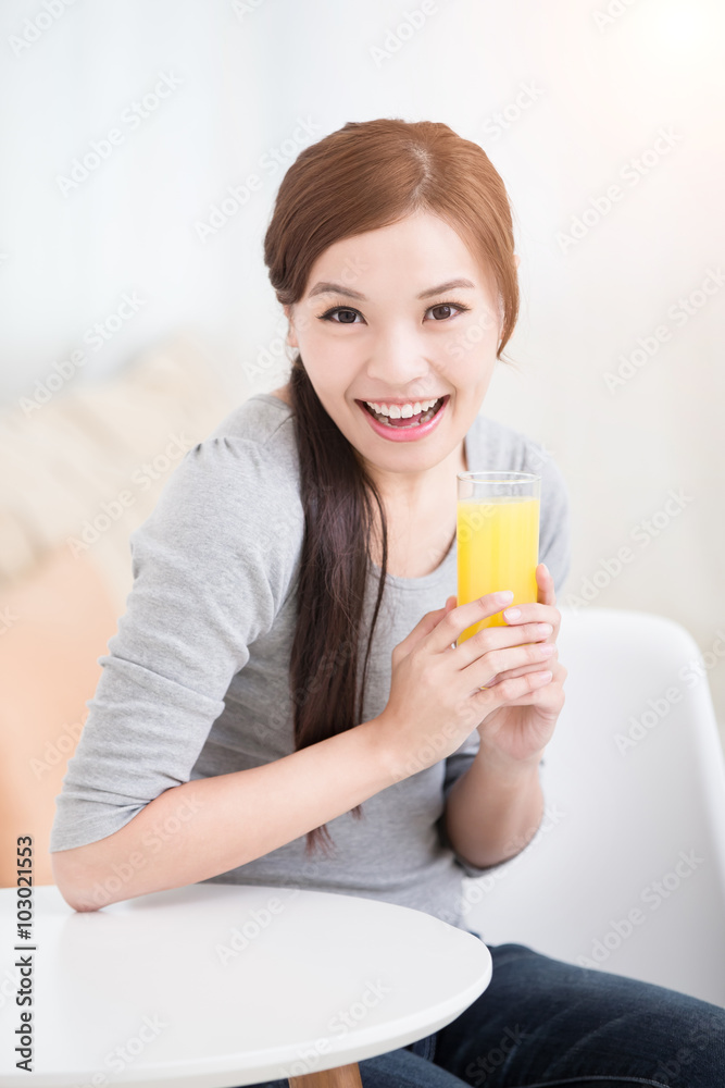 woman hold orange juice