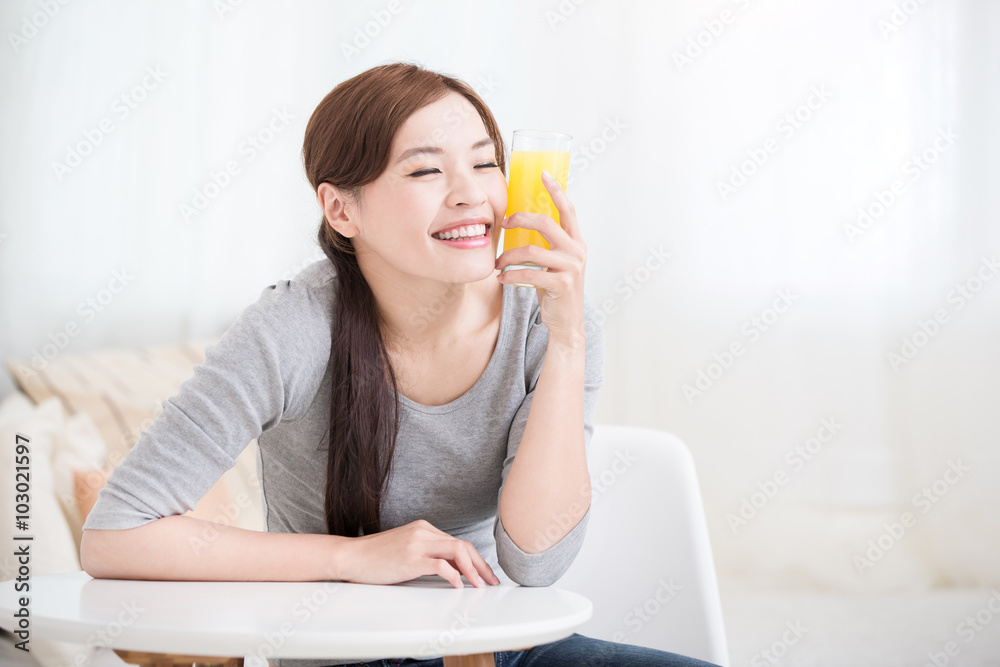 woman hold orange juice