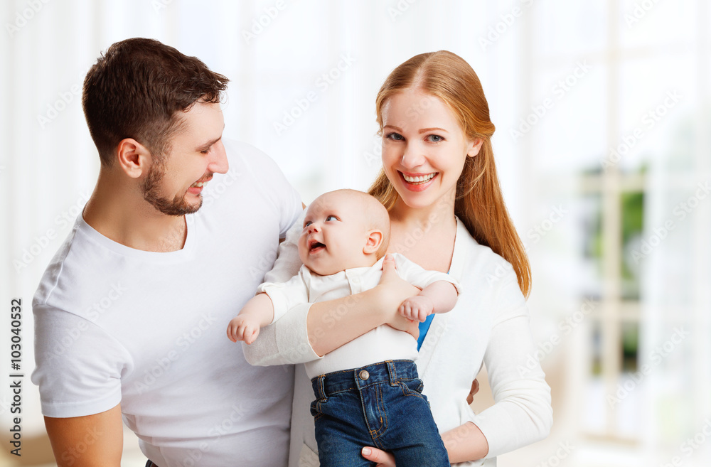 happy family mother, father and son, baby at home