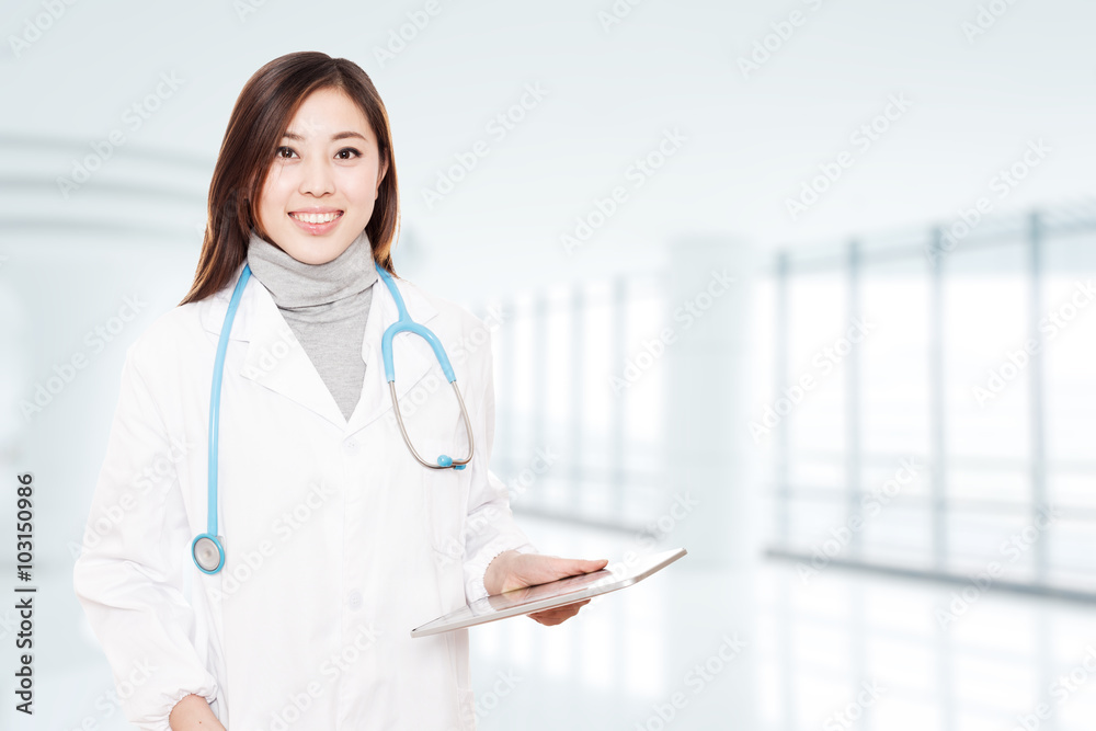 young beautiful woman doctor in white uniform in hospital