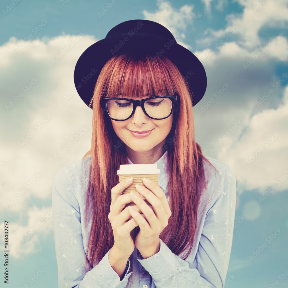 Composite image of smiling hipster woman drinking coffee